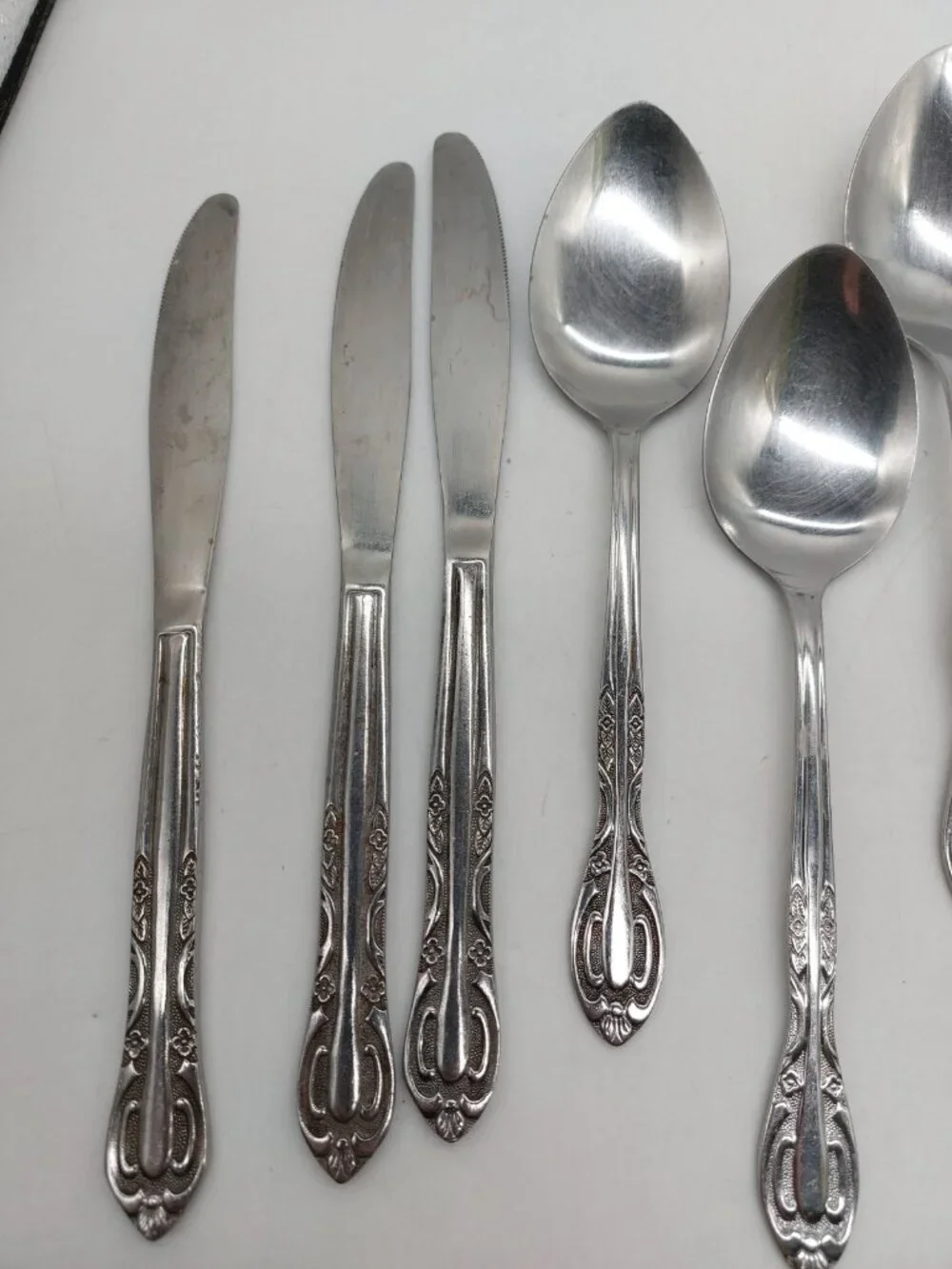 Northland Korea Stainless Flatware w Roses Spoons Knives Forks Lot Of 9